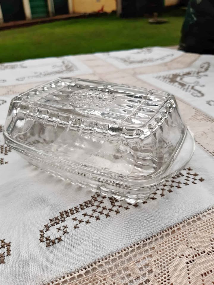 Vintage butter dish, specifically identified as a Vintage Alco Crystala Pressed Glass Butter Dish. Vintage butter dish, specifically identified as a Vintage Alco Crystala Pressed Glass Butter Dish.