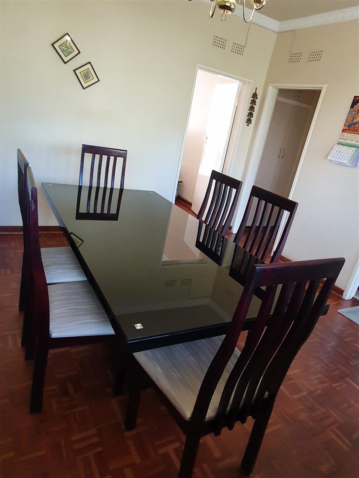 dining table with glass top and 6 chairs