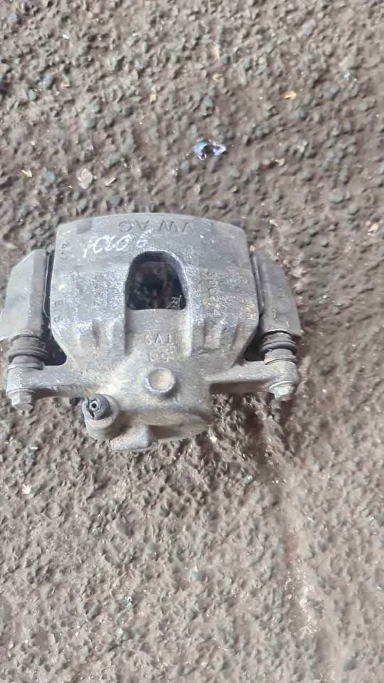 Polo 6 LH brake caliper