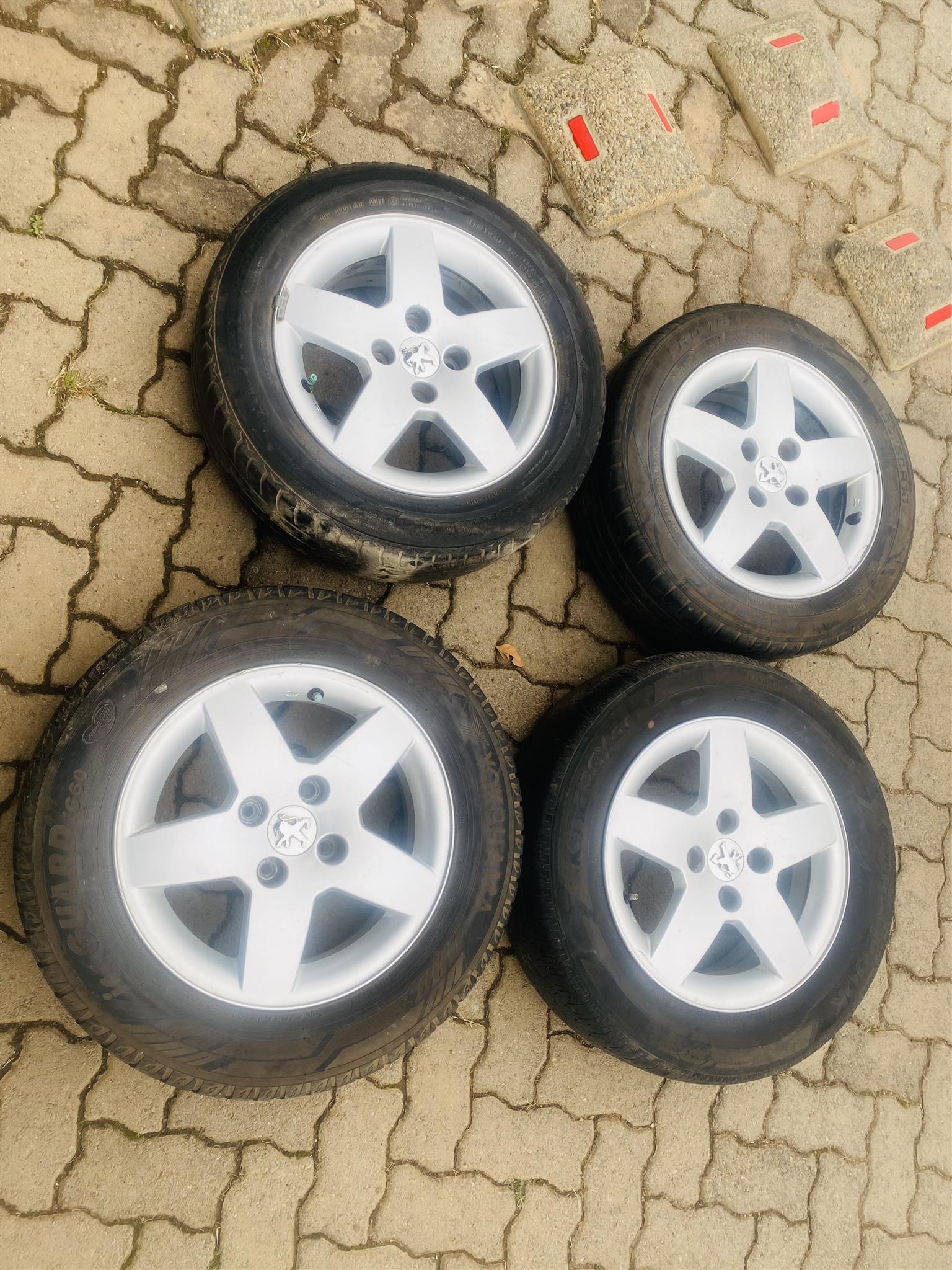 Peugeot 15 inch rims and tyres for sale in good condition set of 4 - Private Seller Peugeot 15 inch rims and tyres for sale in good condition set of 4 - Private Seller