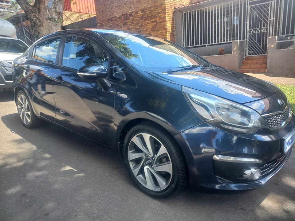 2017 KIA RIO TEC SEDAN 1.4 PETROL, MANUAL  NAVY BLUE COLOR, MILEAGE PRICE . LEATHER
