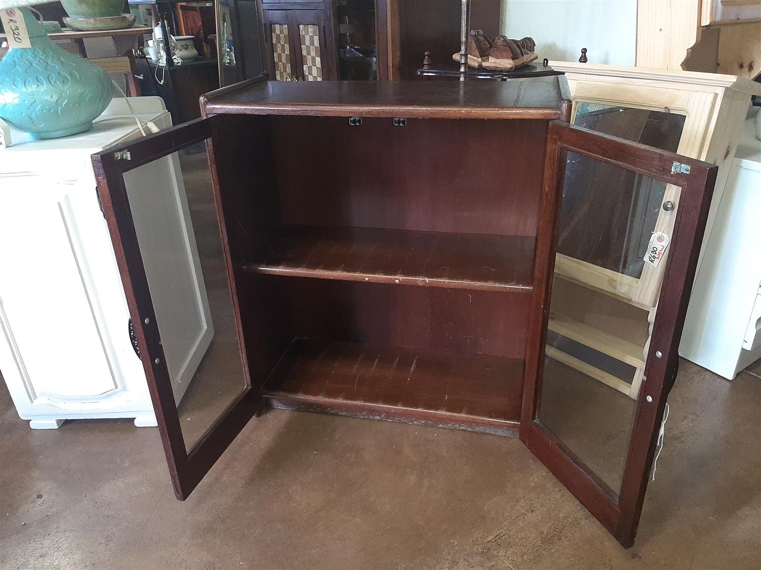 Small, glass-fronted bookcase or display cabinet