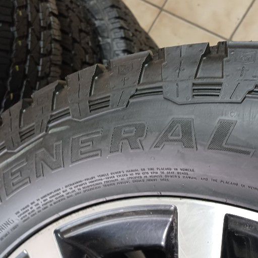 Isuzu rims and general grabber at3 tyres Isuzu rims and general grabber at3 tyres