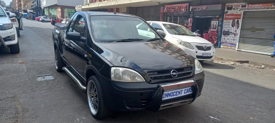 2011 OPEL CORSA BAKKIE 1.4 MANUAL TRANSMISSION, BLACK COLOUR 96000KM