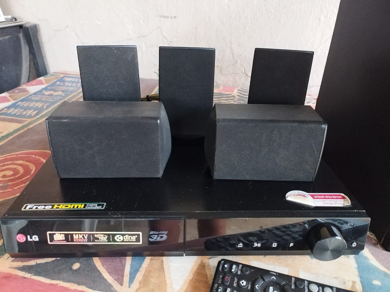 LG 3D Blu-ray home theater surround sound with remote.