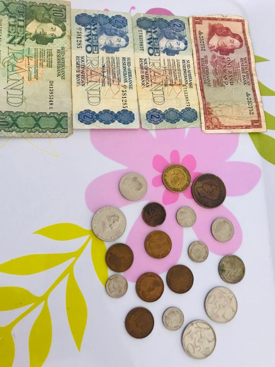 Four South African notes and 250 coins