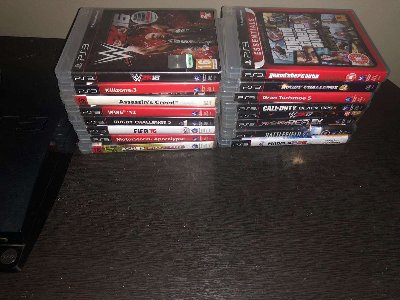 PS3 with all its gamesc+singstar and singstar mics