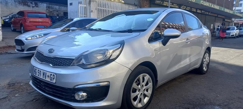 2015 KIA RIO 1.2 PETROL, MANUAL TRANSMISSION, SILVER COLOUR