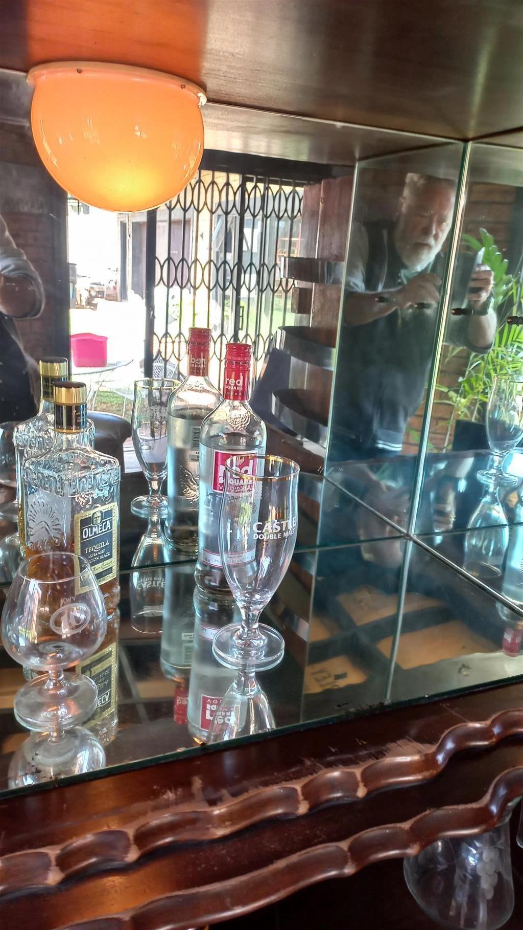 Imbuia ball and claw liquor cabinet