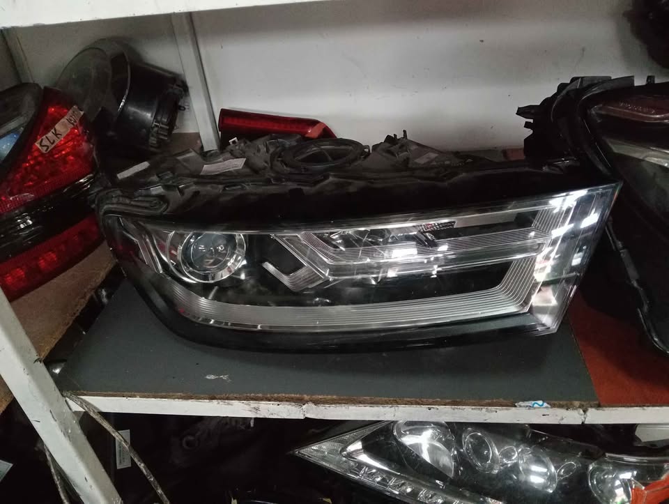 Audi Q7 Headlight  Used Auto Body Spare Parts at Sema Spare Center. Affordable - Private Seller