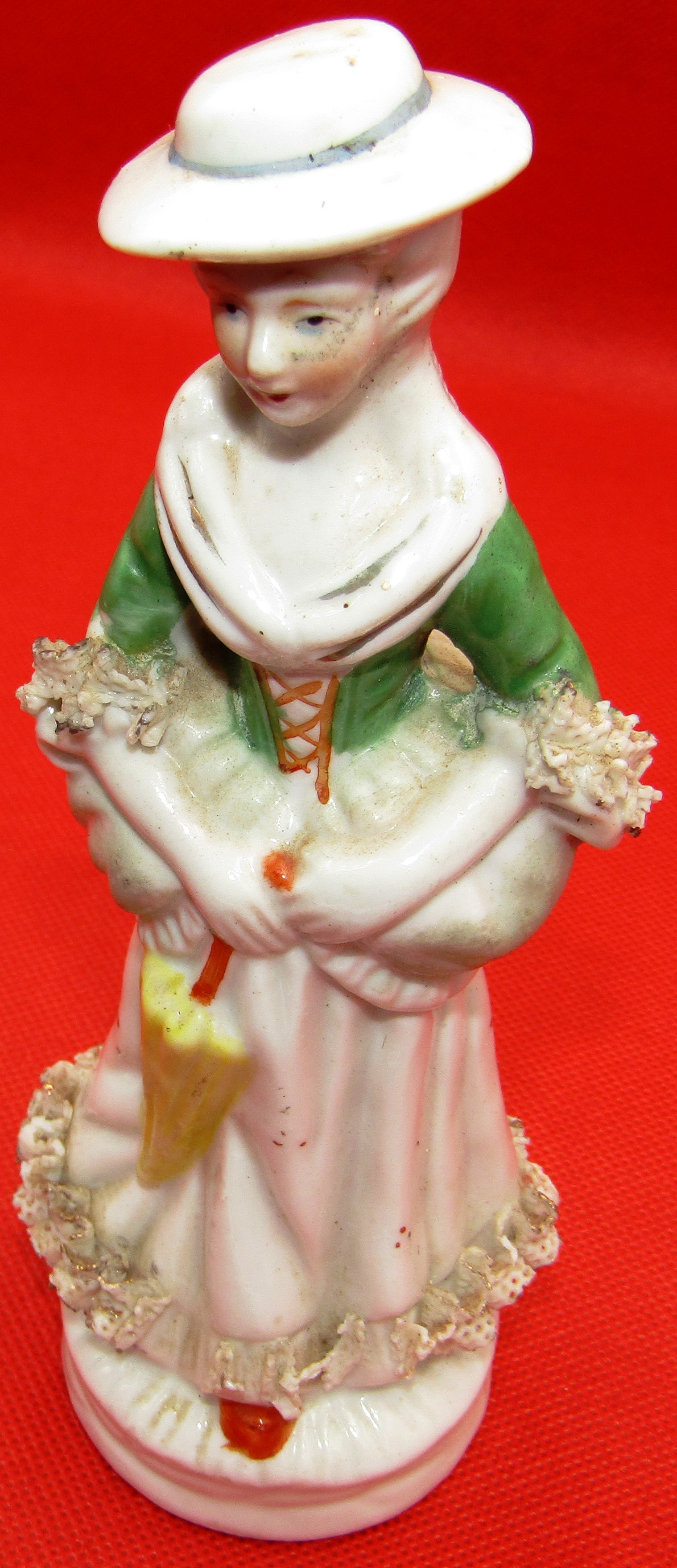 Lady with Hat and Umbrella Porcelain Figurine Lady with Hat and Umbrella Porcelain Figurine