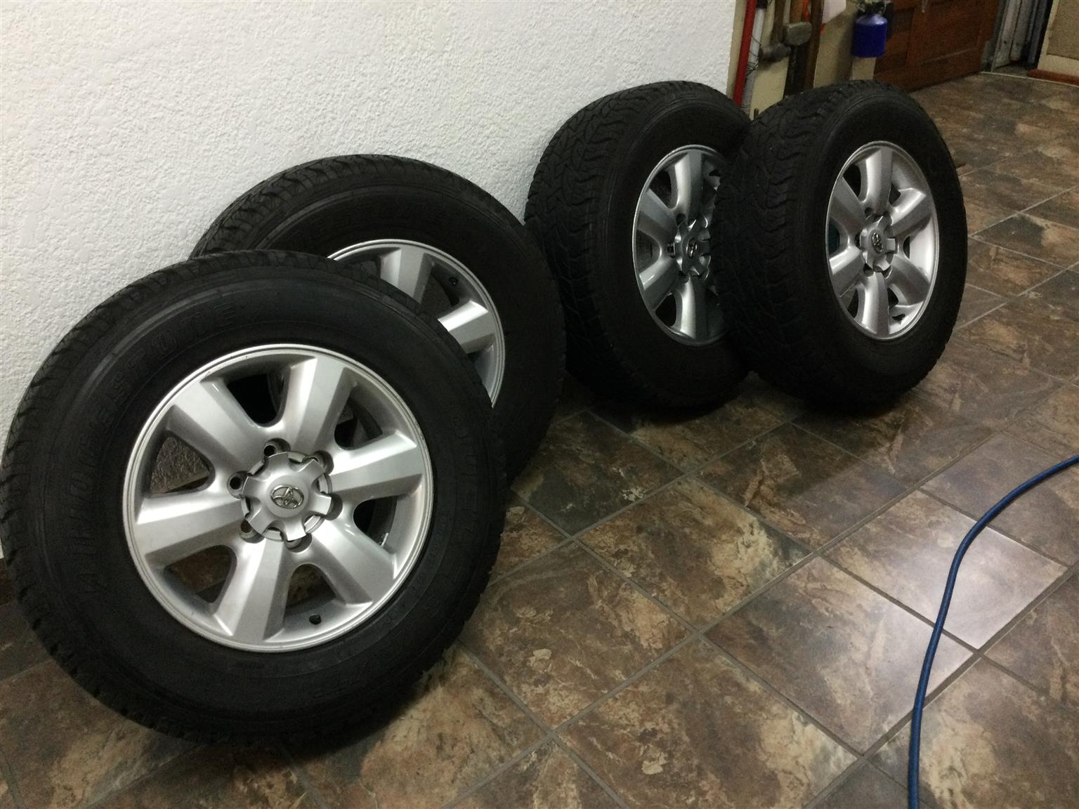 Toyota Fortuner rims with tyres. 265/65/17 - Private Seller