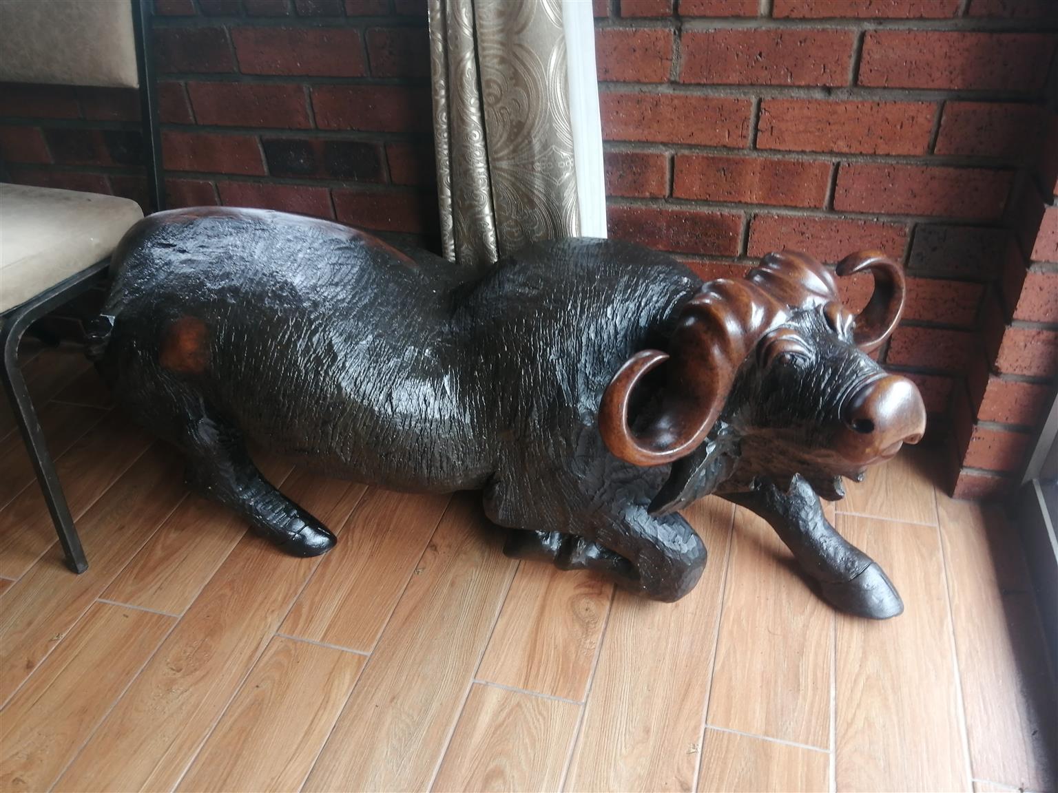 Large Wooden Animal Sculptures. Pair of Buffaloes carved from solid iron wood.