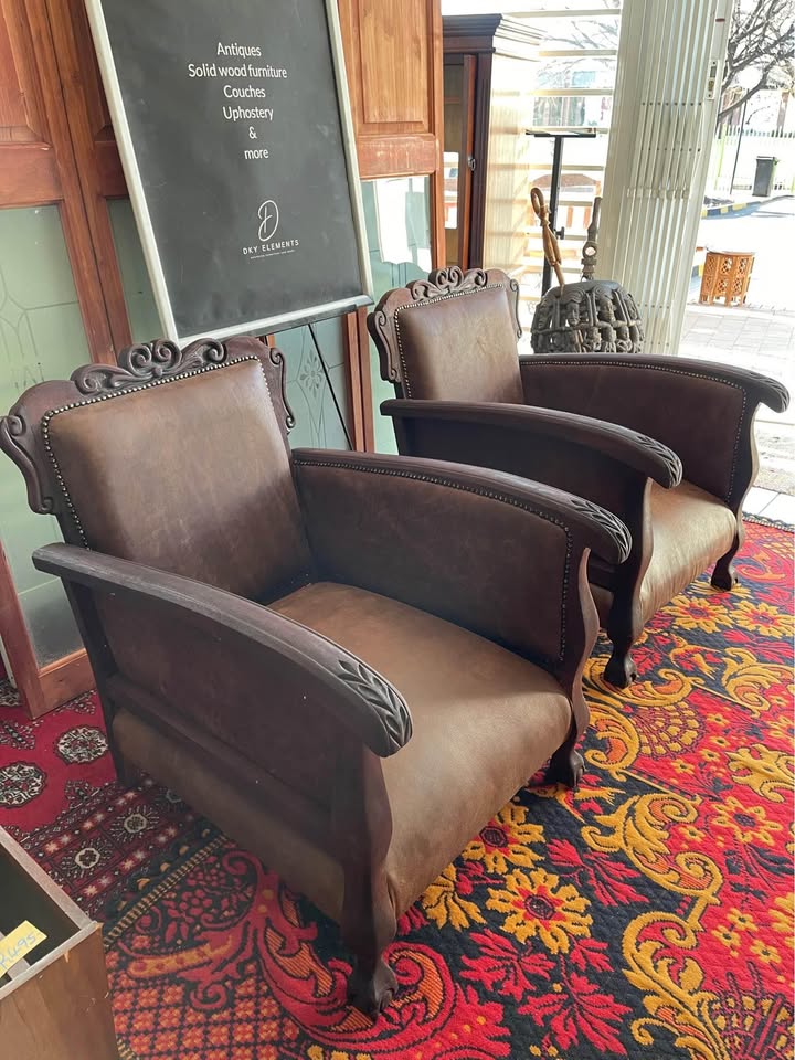Antique Chairs - upholstered in brown buffalo leather ( price is per chair)