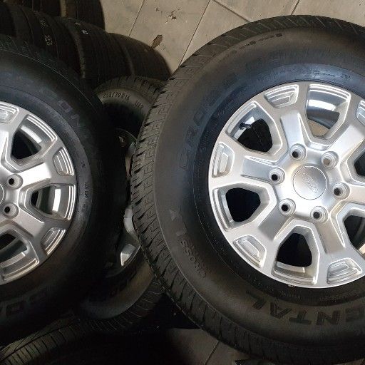 90% new fairly used Ford rims and tyre