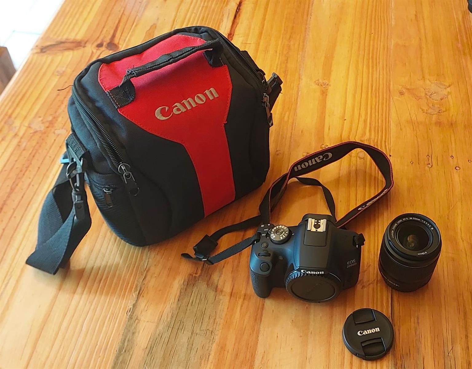 Canon EOS 2000D Camera, Canon 18-55mm lens, bag, battery, memory card