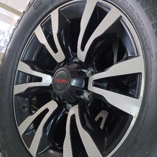 Isuzu rims and general grabber at3 tyres