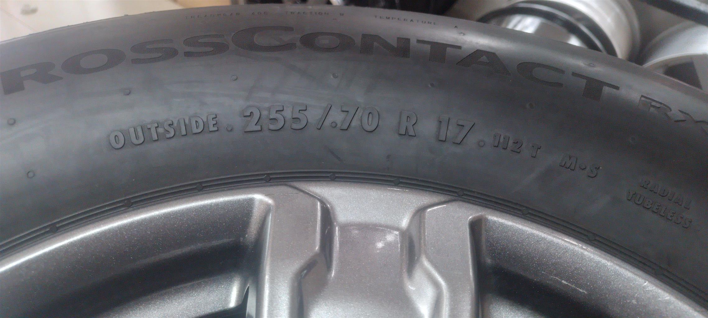 17 inch OEM Ford New gen rim with new 225/70 R17 continental cross contact tyres - Private Seller