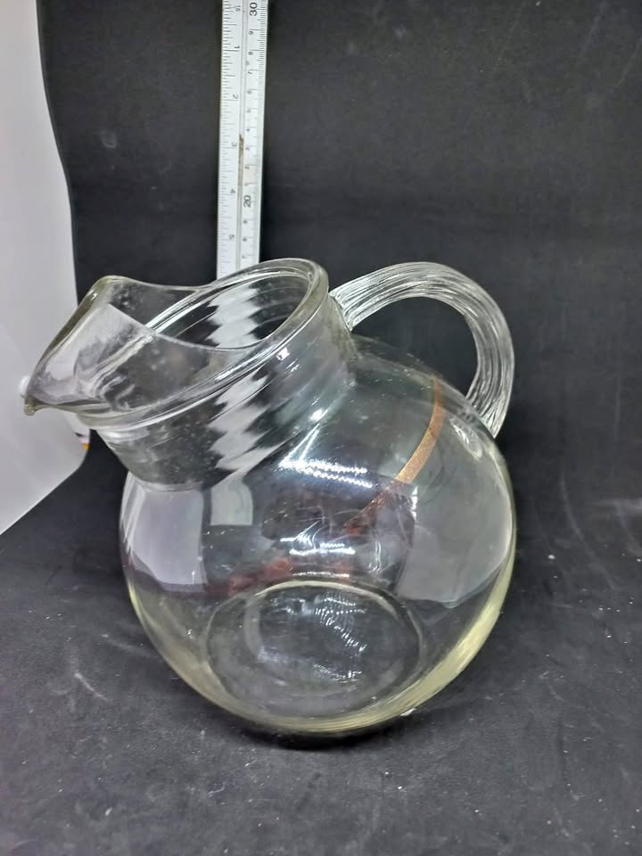 Vintage tilt ball pitcher with ice spout