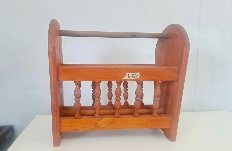 Vintage wooden magazine rack.
