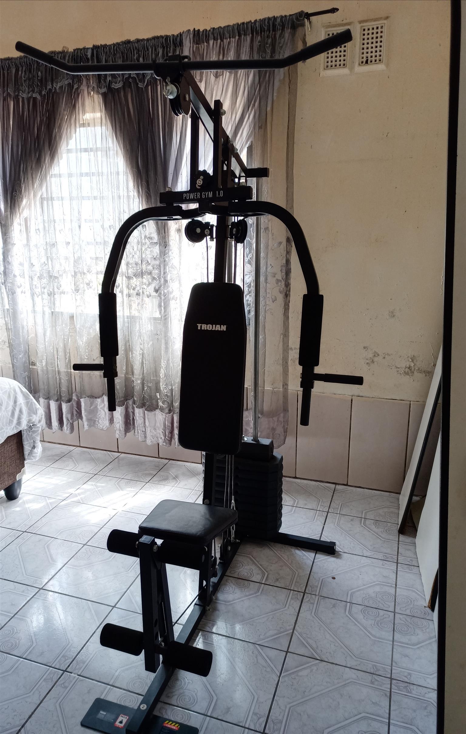 Trojan best sale gym machine