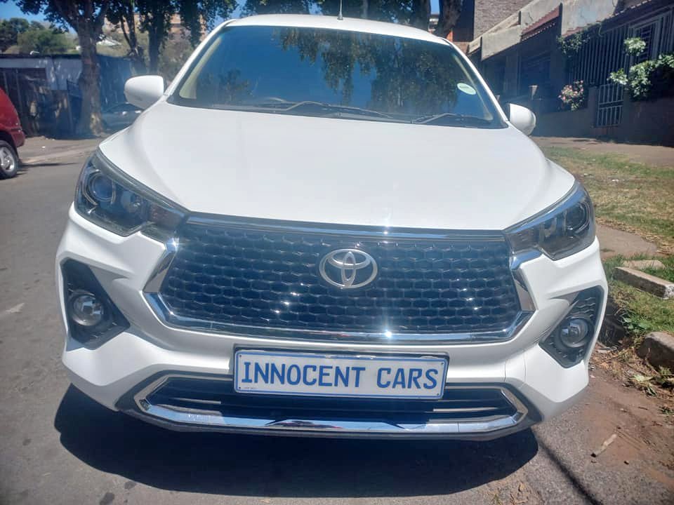 2024 TOYOTA RUMION 1.5TX PETROL, KEYLESS, MANUAL, WHITE COLOR, MILEAGE 32000KMS,