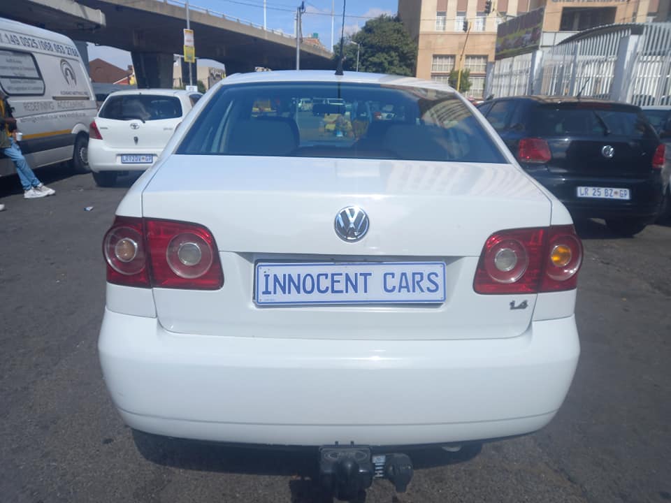 2012 VW POLO VIVO SEDAN 1.4 PETROL, MANUAL TRANSMISSION, WHITE COLOUR