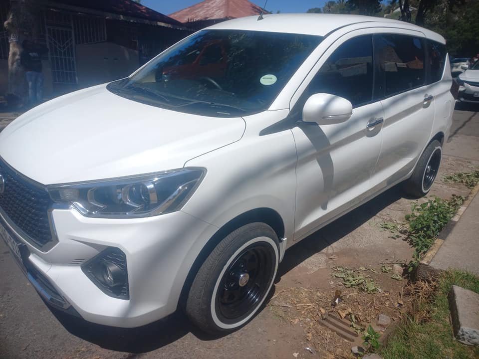 2024 TOYOTA RUMION 1.5TX PETROL, KEYLESS, MANUAL, WHITE COLOR, MILEAGE 32000KMS,