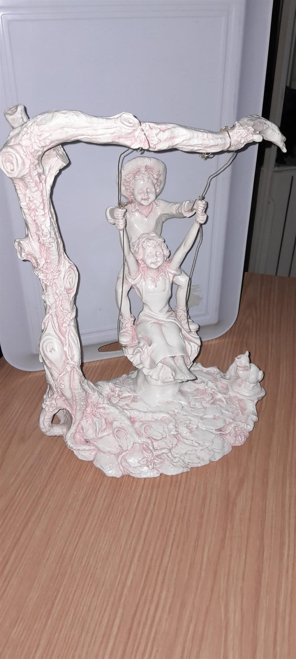 Giuseppe Armani The swing statue