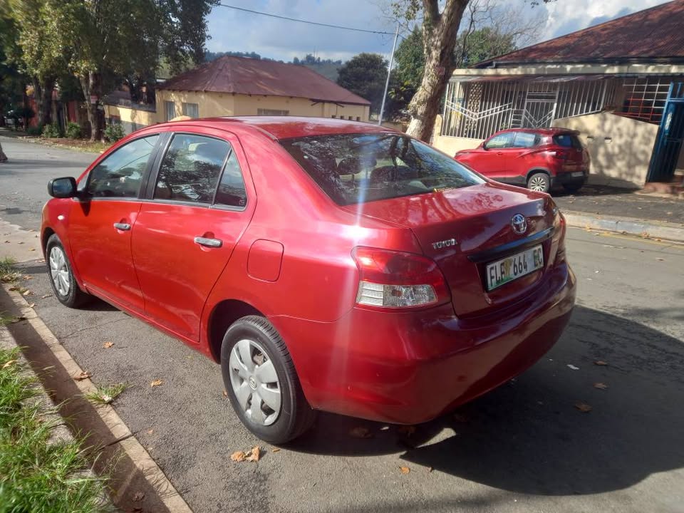 2009 Toyota Yaris Sedan Maroon, Zen3 Petrol, Manual