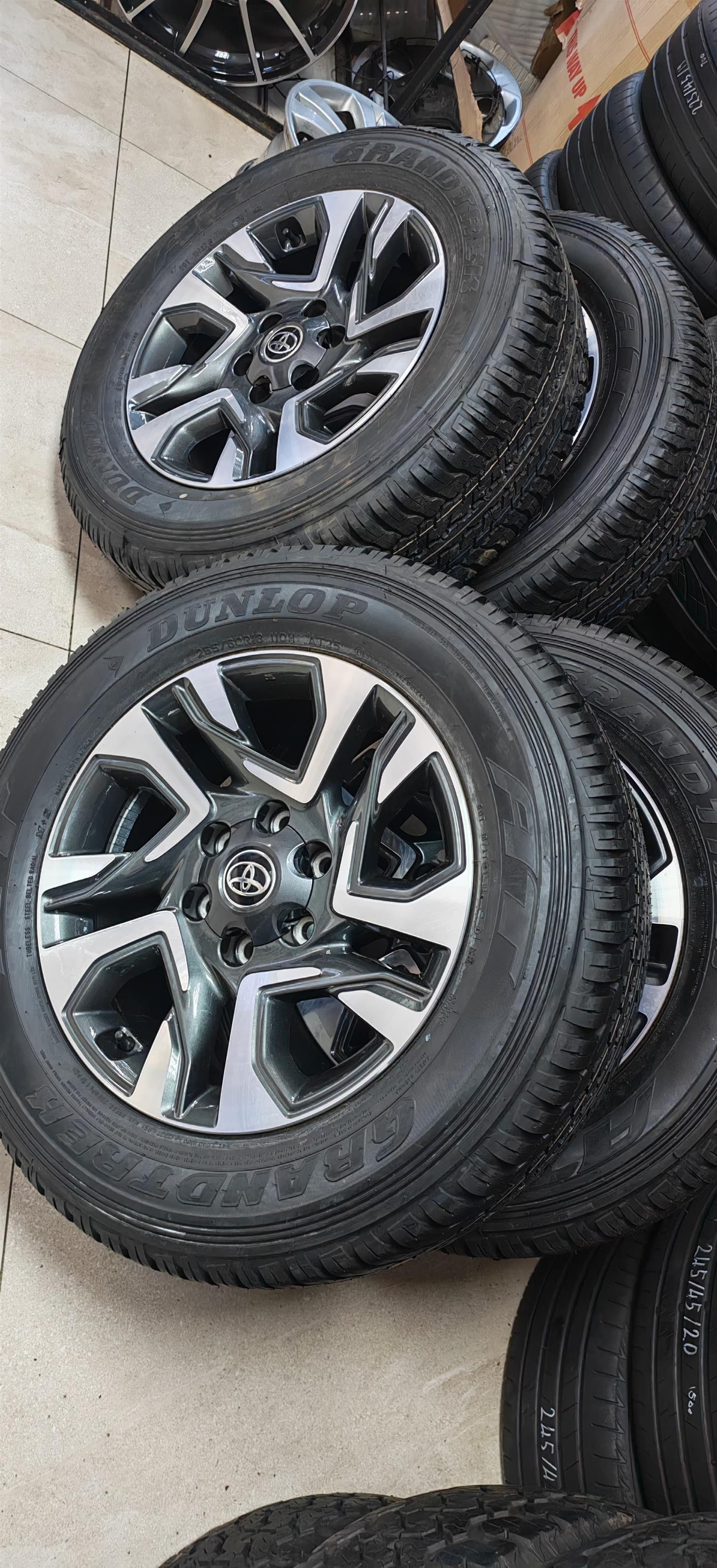 Toyota Fortuner OEM 18" mag with brand new 265/60/18 Dunlop Grandtrek AT25 set R - Private Seller Toyota Fortuner OEM 18" mag with brand new 265/60/18 Dunlop Grandtrek AT25 set R - Private Seller