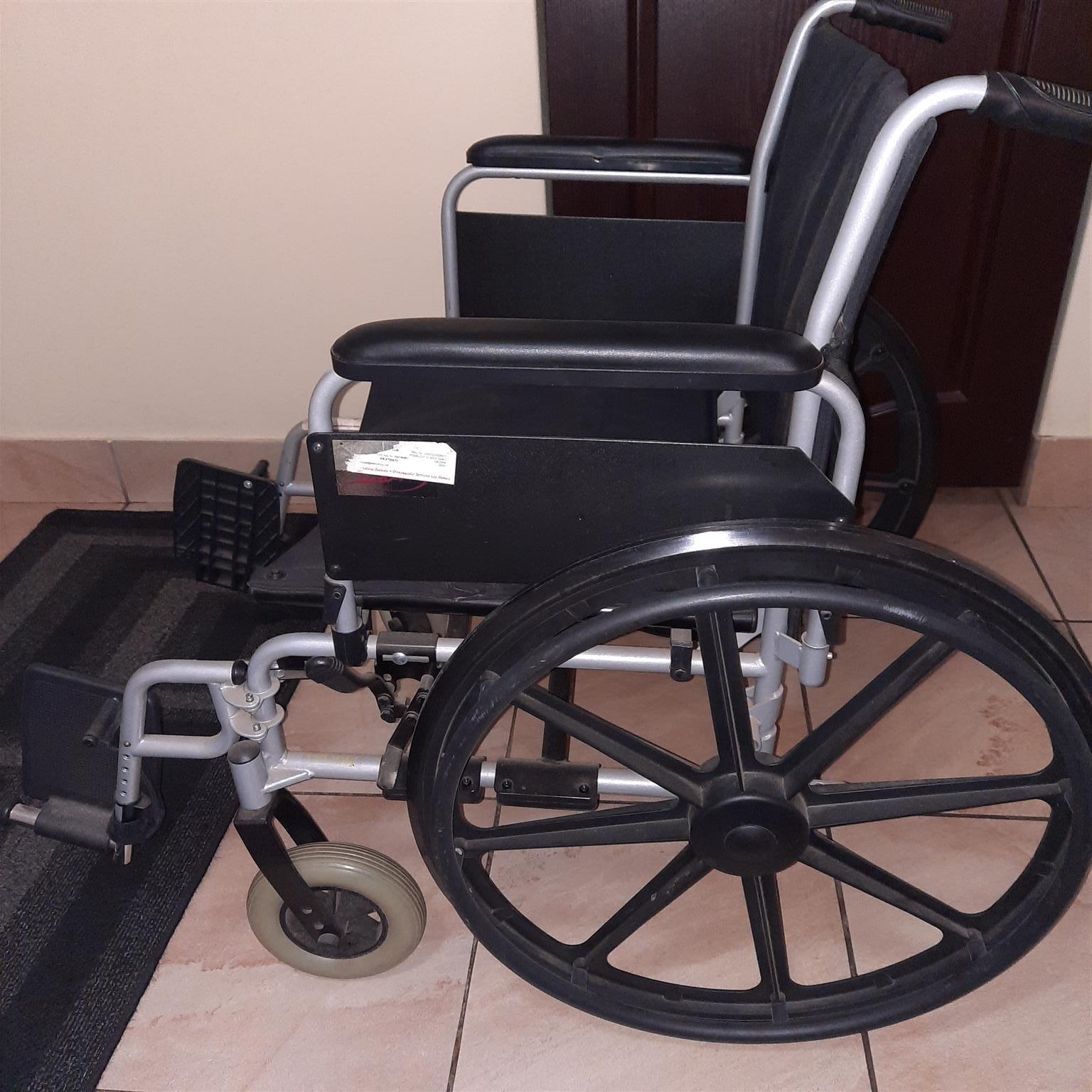 Wheel chair extra heavy duty (150kg max). Used three times. Still in mint condit