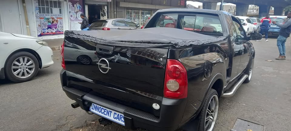 2011 OPEL CORSA BAKKIE 1.4 MANUAL TRANSMISSION, BLACK COLOUR 96000KM