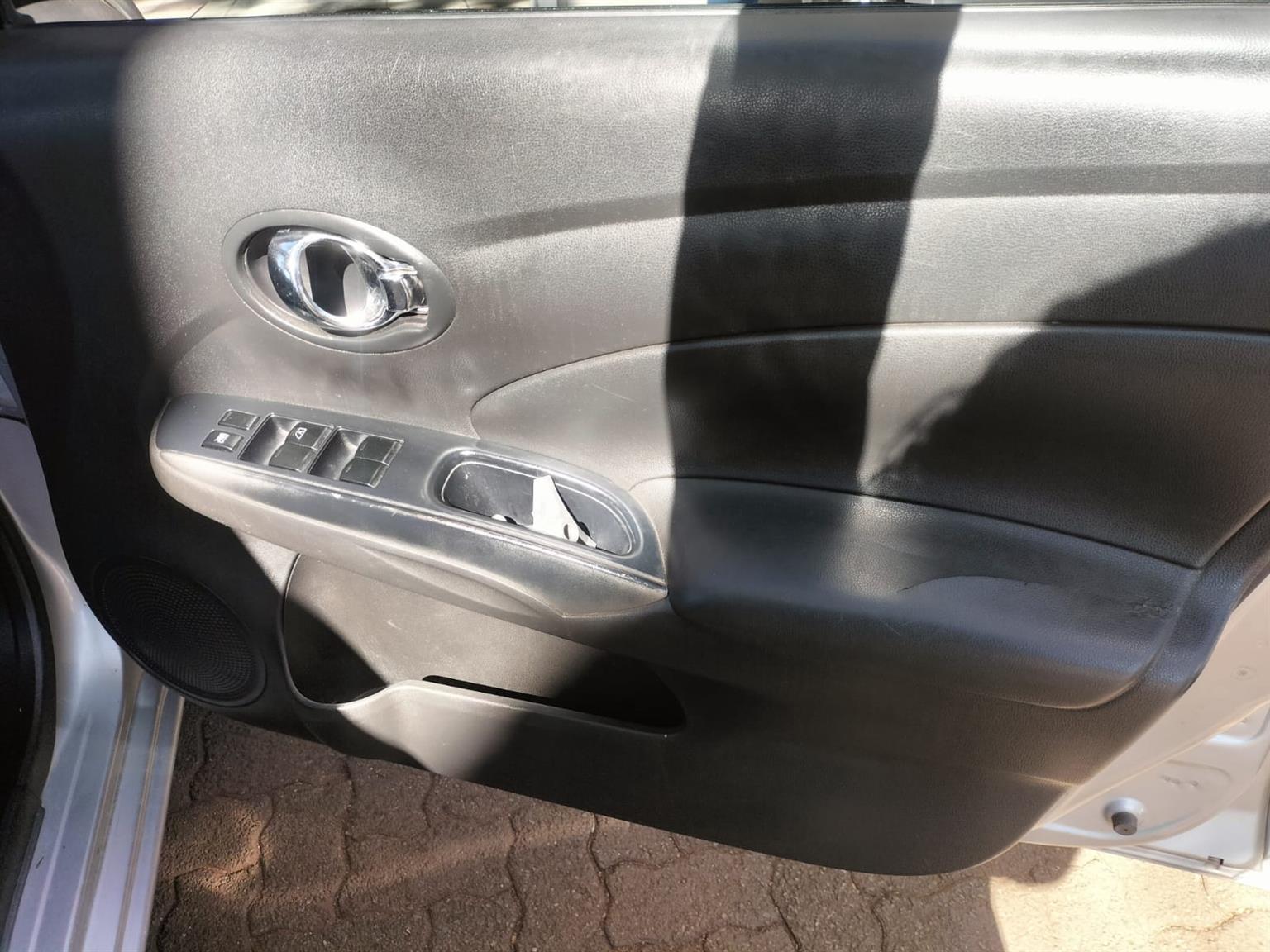 2015 Silver Nissan Almera sedan 1.5 Manual milage 86,000 km petrol