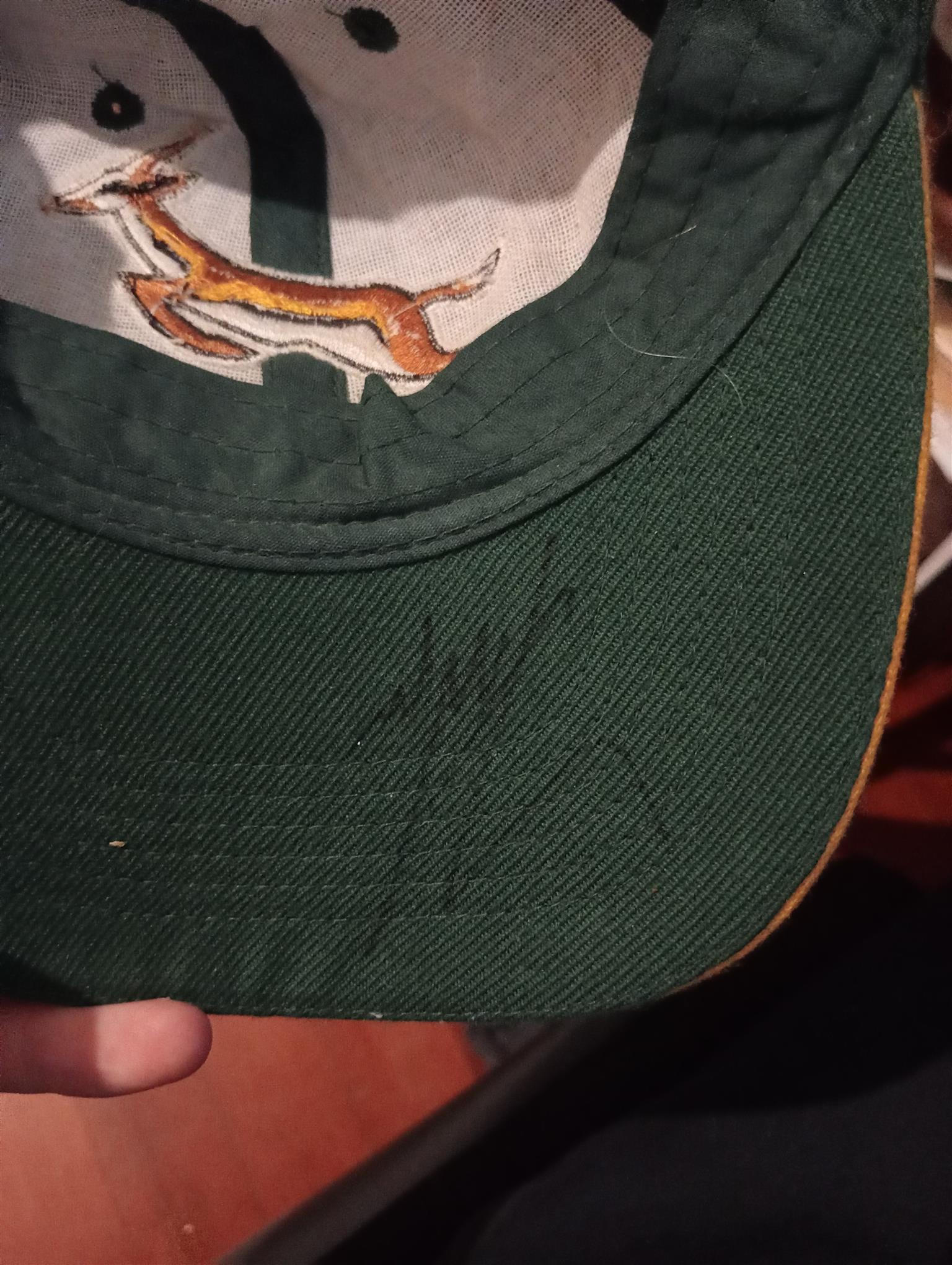 A cap signed by the springbok rugby team.