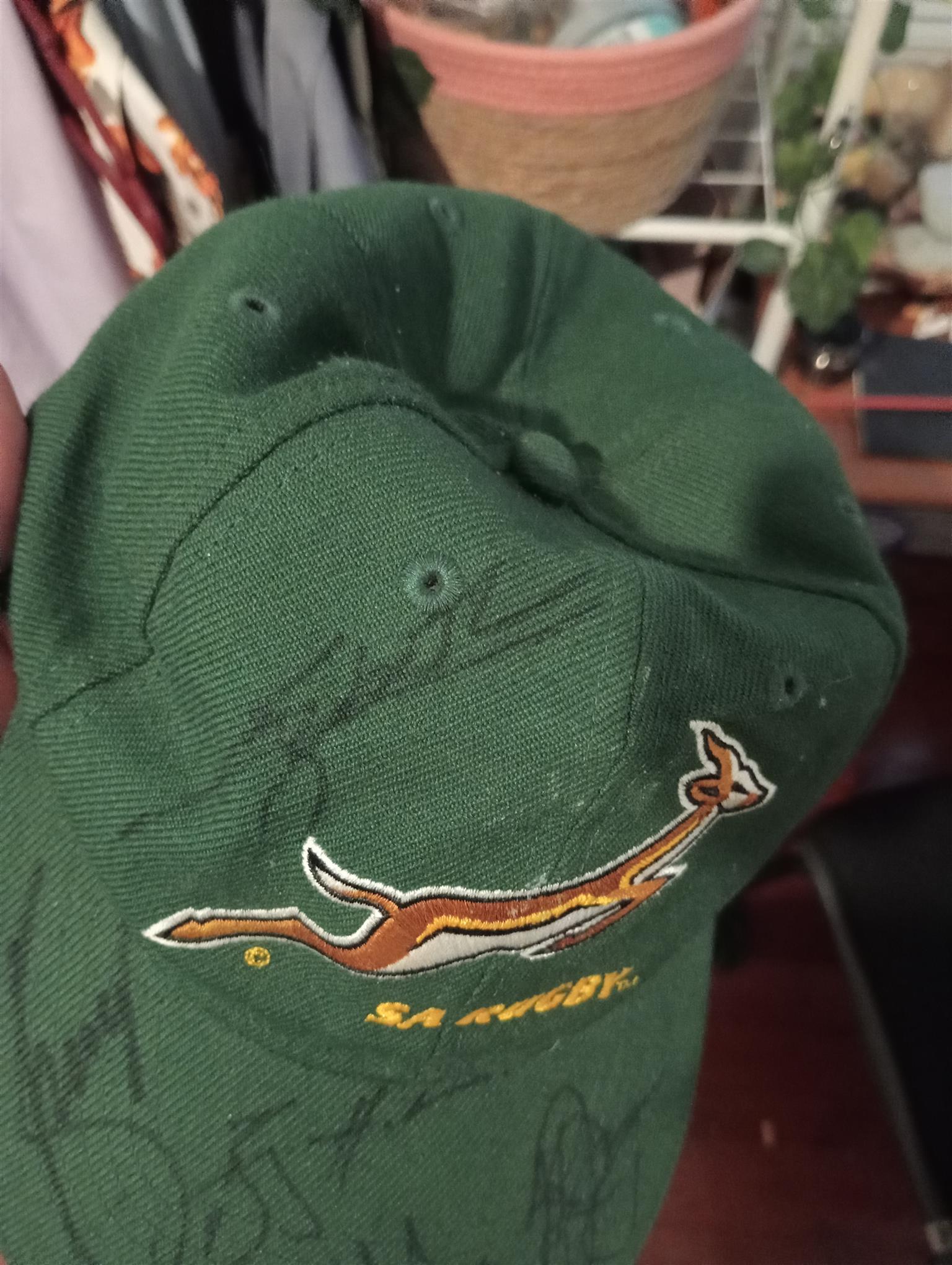 A cap signed by the springbok rugby team.