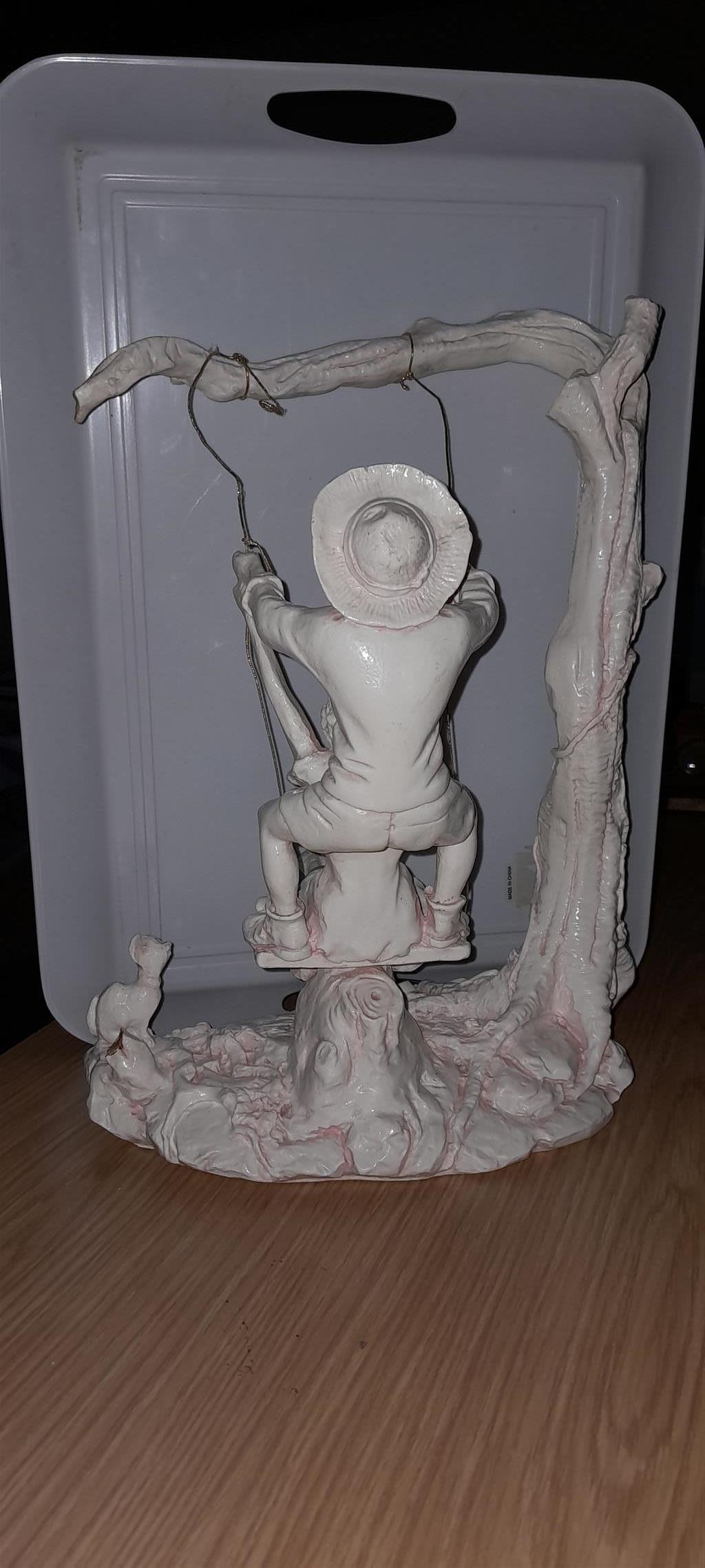 Giuseppe Armani The swing statue