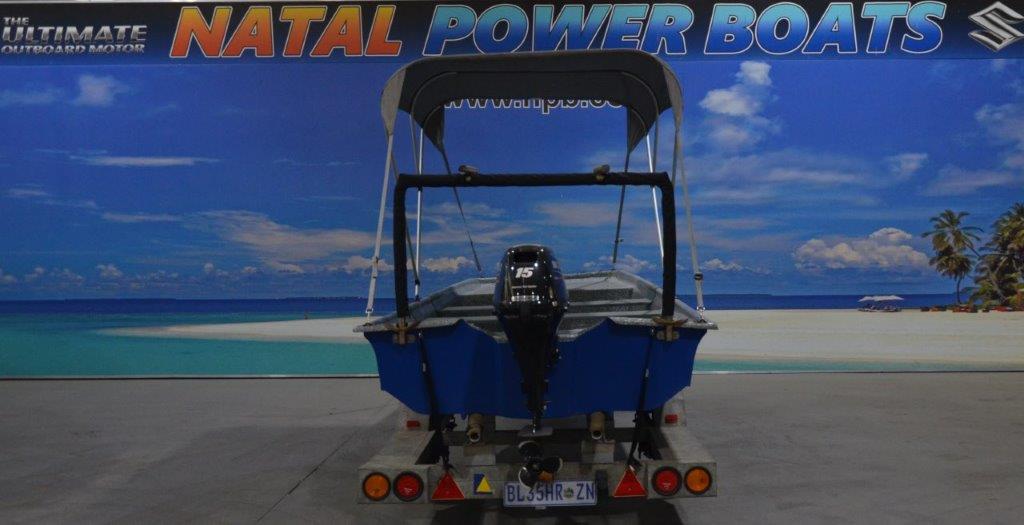 TUG 20 ON TRAILER 15 HP SUZUKI 4 STROKE TILLER