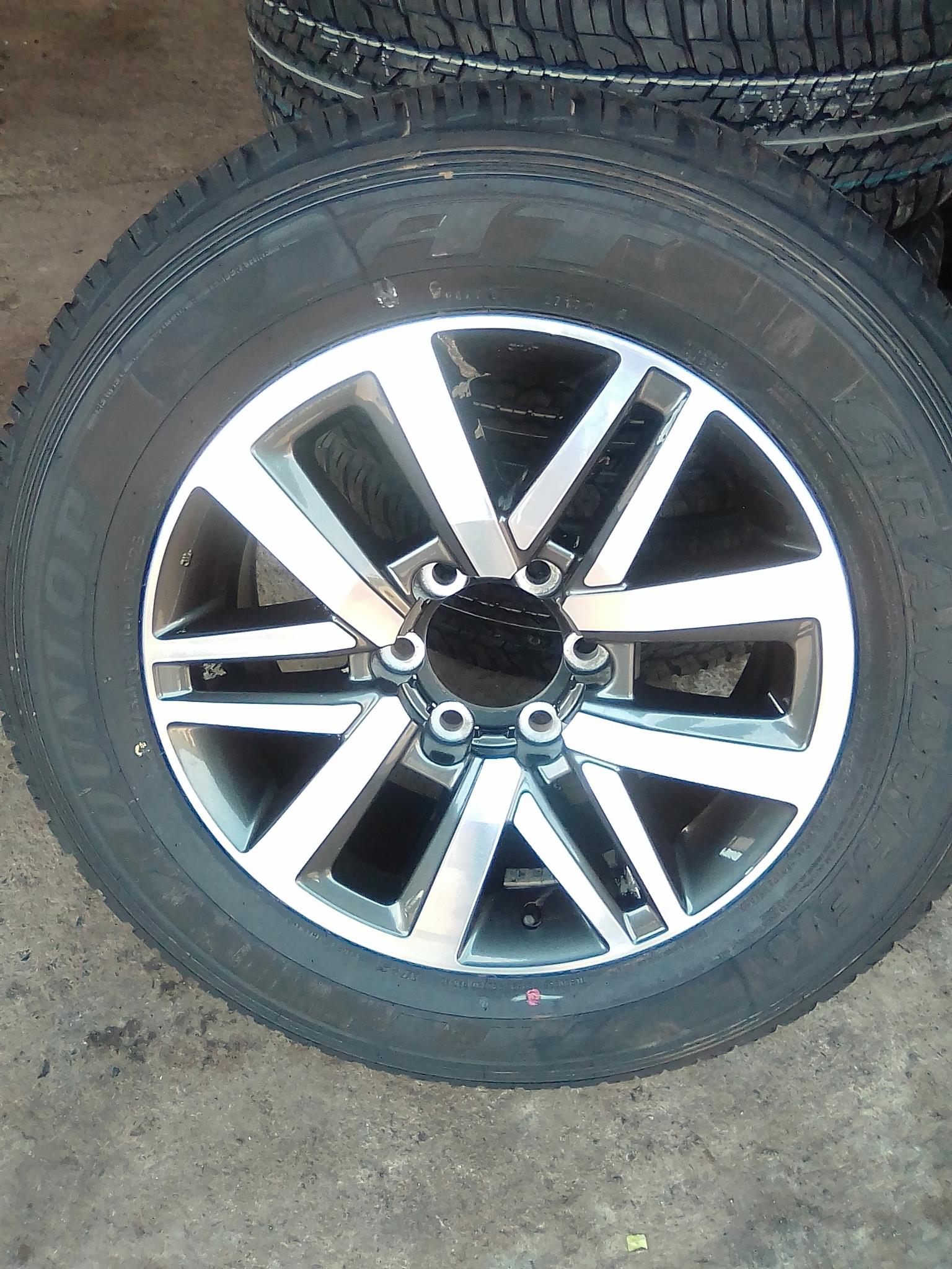 Toyota Hilux/Fortuner 18" original mag with brand new 265/60/18 Dunlop Grandtre - Private Seller Toyota Hilux/Fortuner 18" original mag with brand new 265/60/18 Dunlop Grandtre - Private Seller