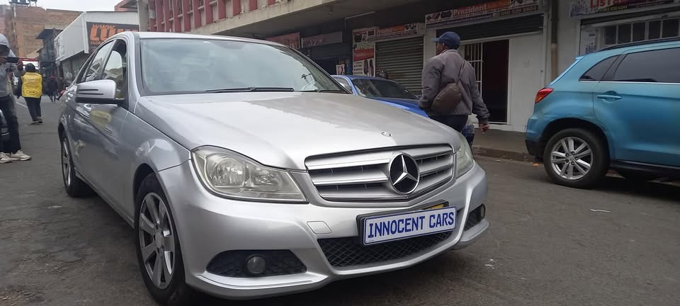 2012 MERCEDES BENZ C180 PETROL AUTOMATIC TRANSMISSION, SILVER COLOUR