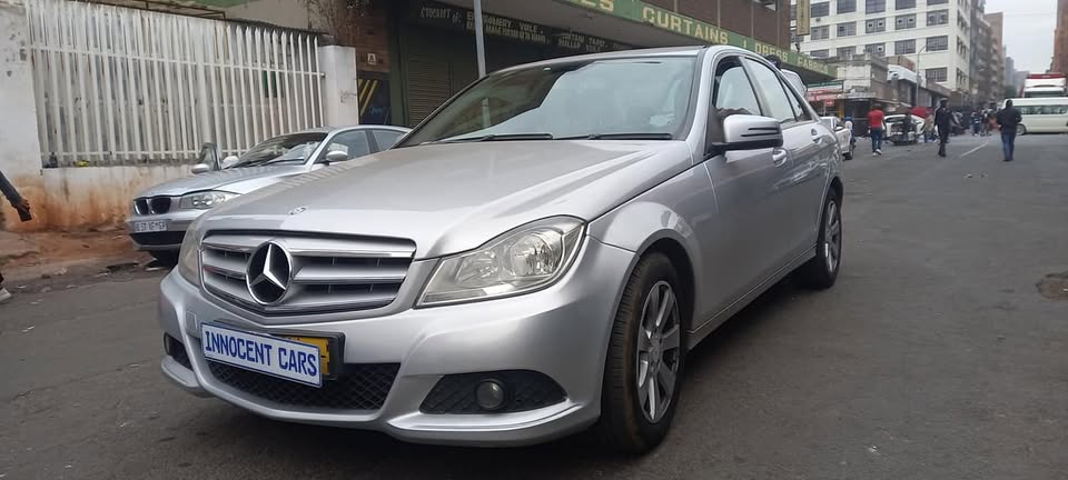 2012 MERCEDES BENZ C180 PETROL AUTOMATIC TRANSMISSION, SILVER COLOUR