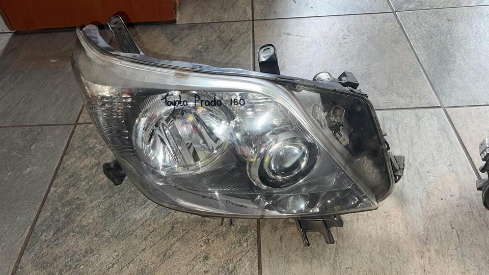 Toyota Prado j150 Original headlights and main grill available call or WhatsApp - Private Seller