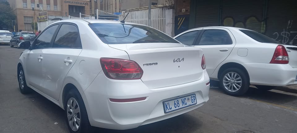 2022 KIA PEGAS 1.4 SEDAN PETROL, WHITE COLOUR