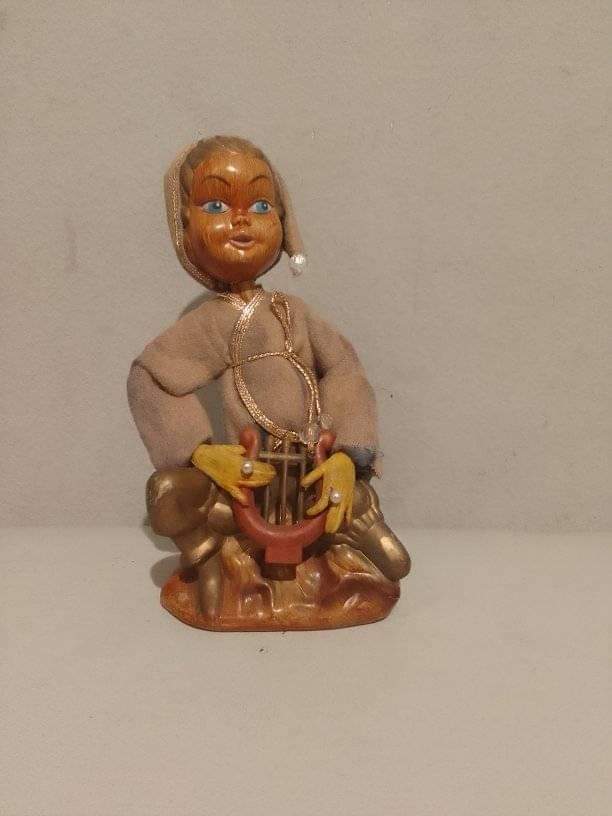 A vintage Asian doll A vintage Asian doll