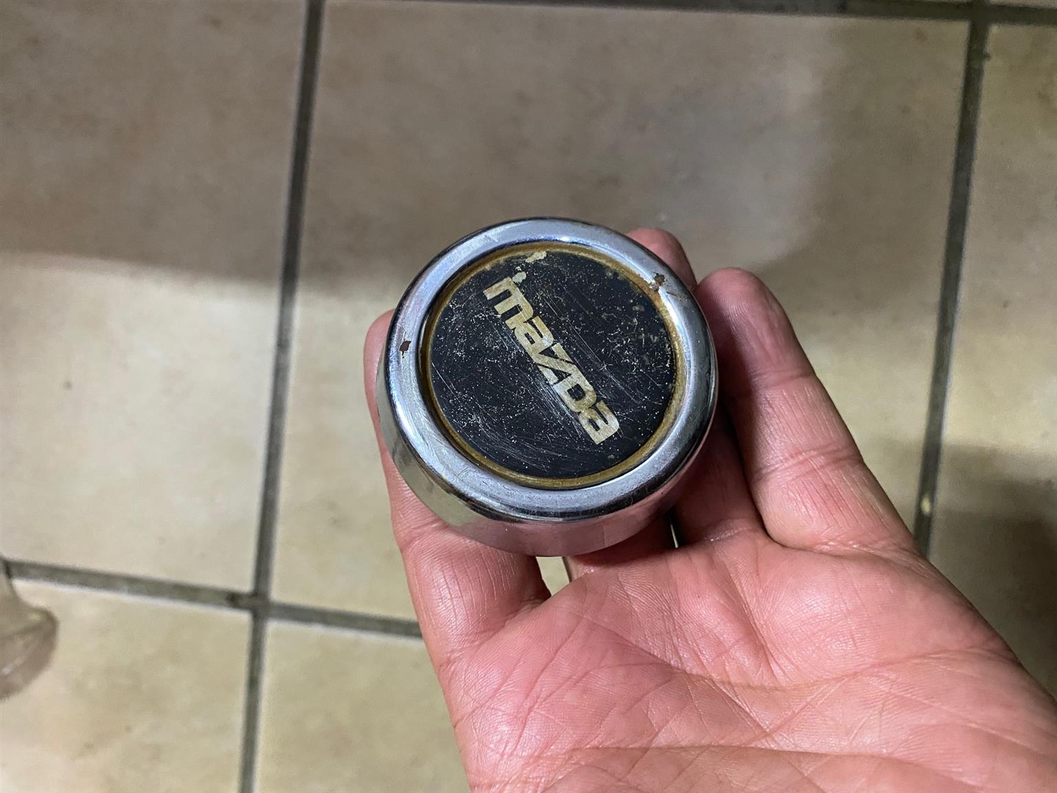 Mazda centre wheel cap for rim. Mazda centre wheel cap for rim.