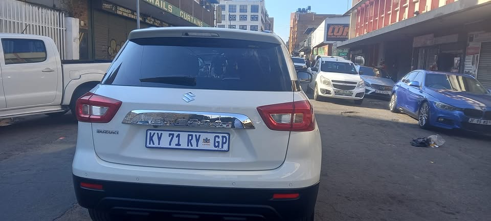 2022 SUZUKI BREEZA VITARA 1.5 MANUAL TRANSMISSION, WHITE COLOUR