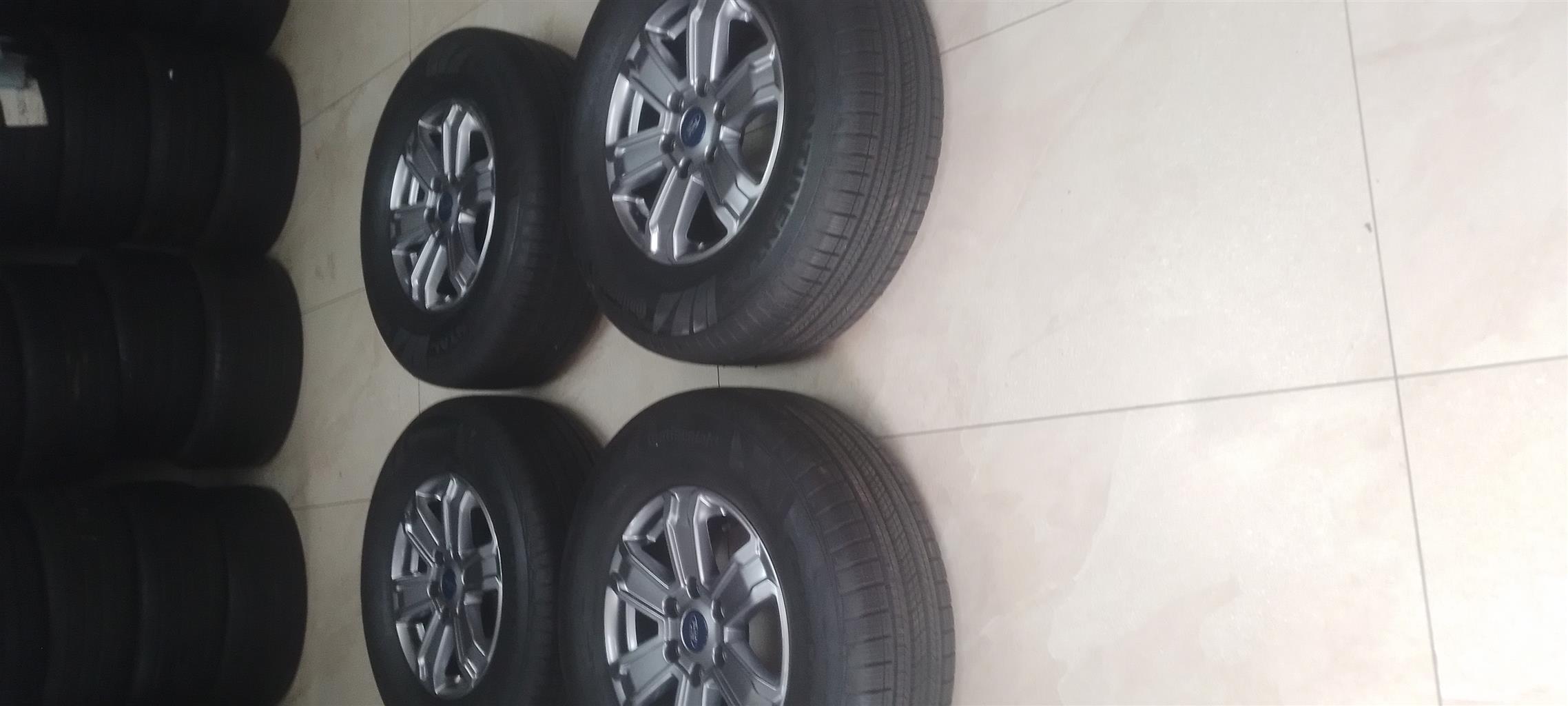 17 inch OEM Ford New gen rim with new 225/70 R17 continental cross contact tyres - Private Seller