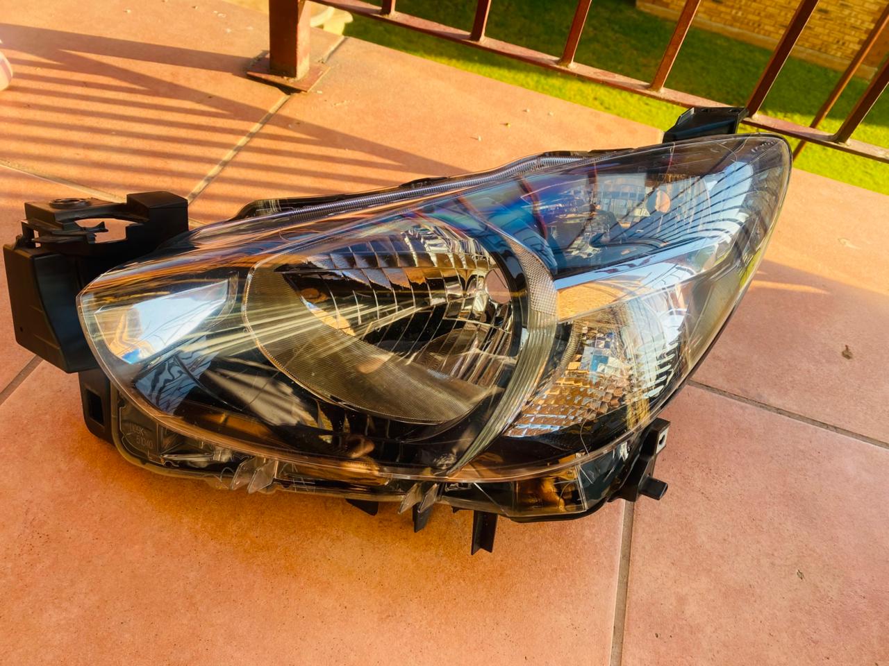 Mazda 2 left headlight for sale in good condition - Private Seller