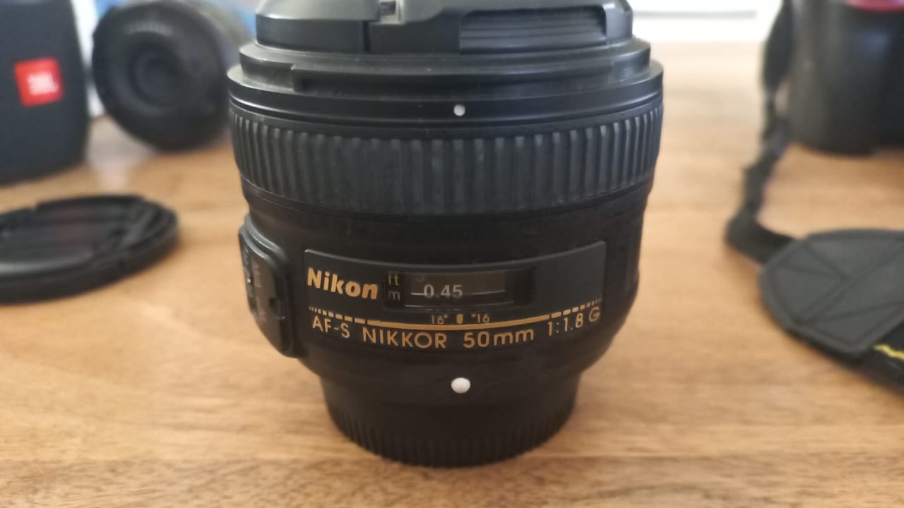 Nikon camera with lenses and battery pack