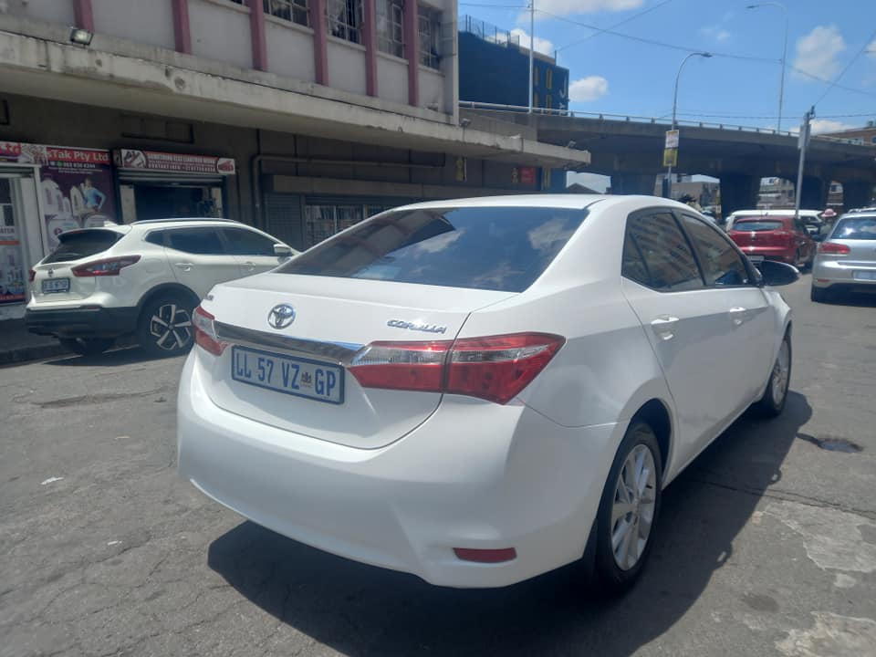 2015 TOYOTA COROLLA PRESTIGE 1.6 PETROL, MANUAL TRANSMISSION, WHITE COLOUR